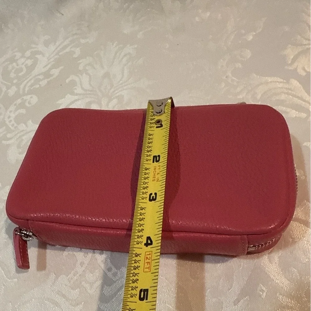 Coach hot pink zip wallet suede-lined multiple zipper compartments. 6